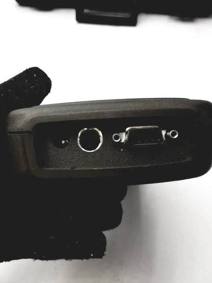 Black handheld eutechninc precision temperature 4500 thermo meter rear panel with circular port and rectangular connector