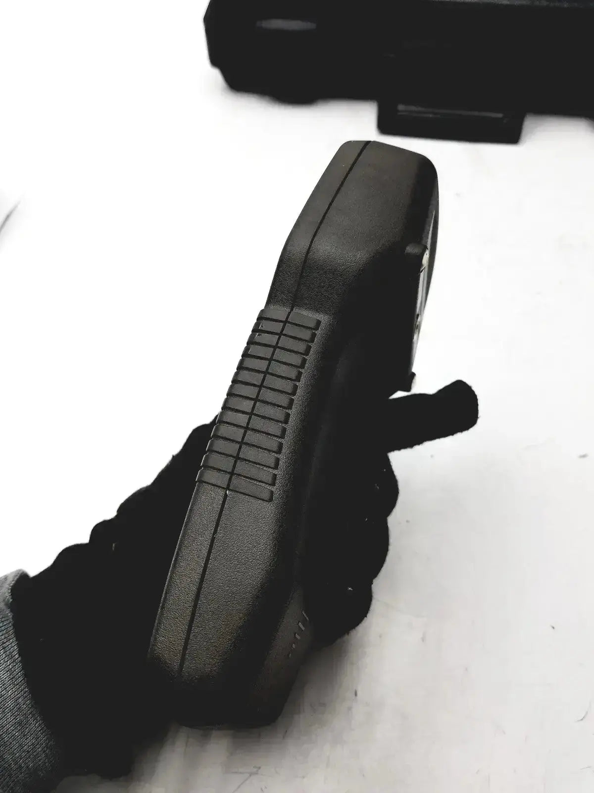 Black textured grip handle of eutechninc precision temperature 4500 thermo meter handheld device for accuracy control