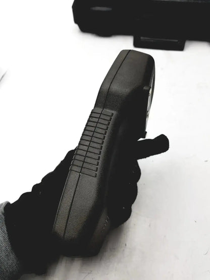 Black textured grip handle of eutechninc precision temperature 4500 thermo meter handheld device for accuracy control