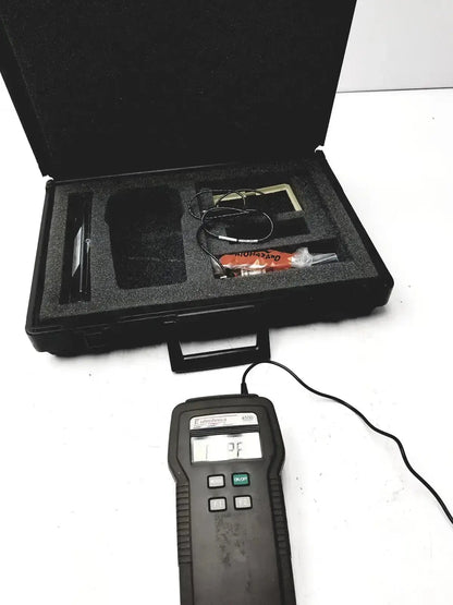 Black handheld eutechninc precision temperature thermo meter with digital display and control buttons for precise readings