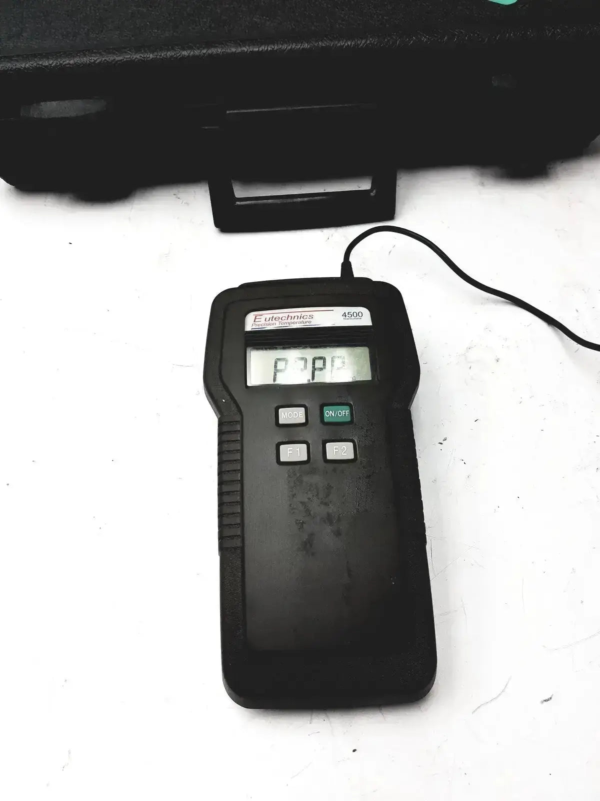 Black e-technics 4500 digital handheld device with lcd screen and four buttons for eutechninc precision temperature use