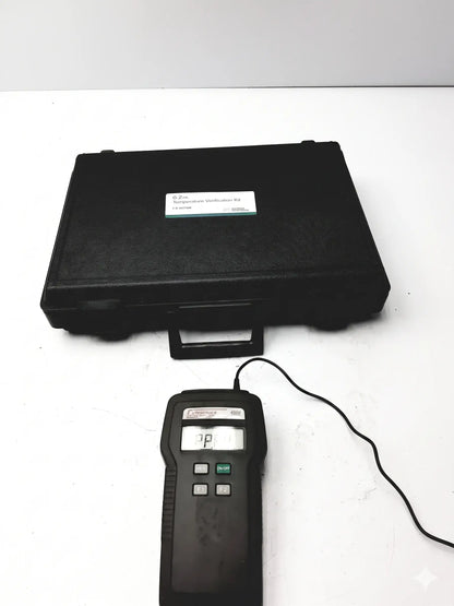 Black eutechninc precision temperature 4500 thermo meter with digital display and control buttons beside carrying case