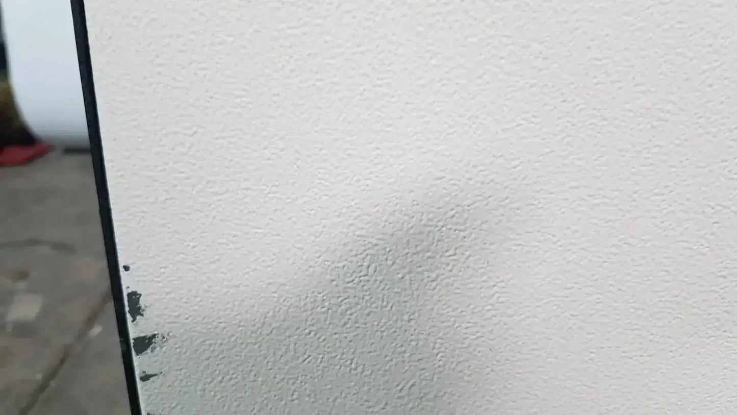 White textured wall with black vertical edge adjacent to excellent spex 6850 freezer mill for biomedical evaluation of hospital surplus
