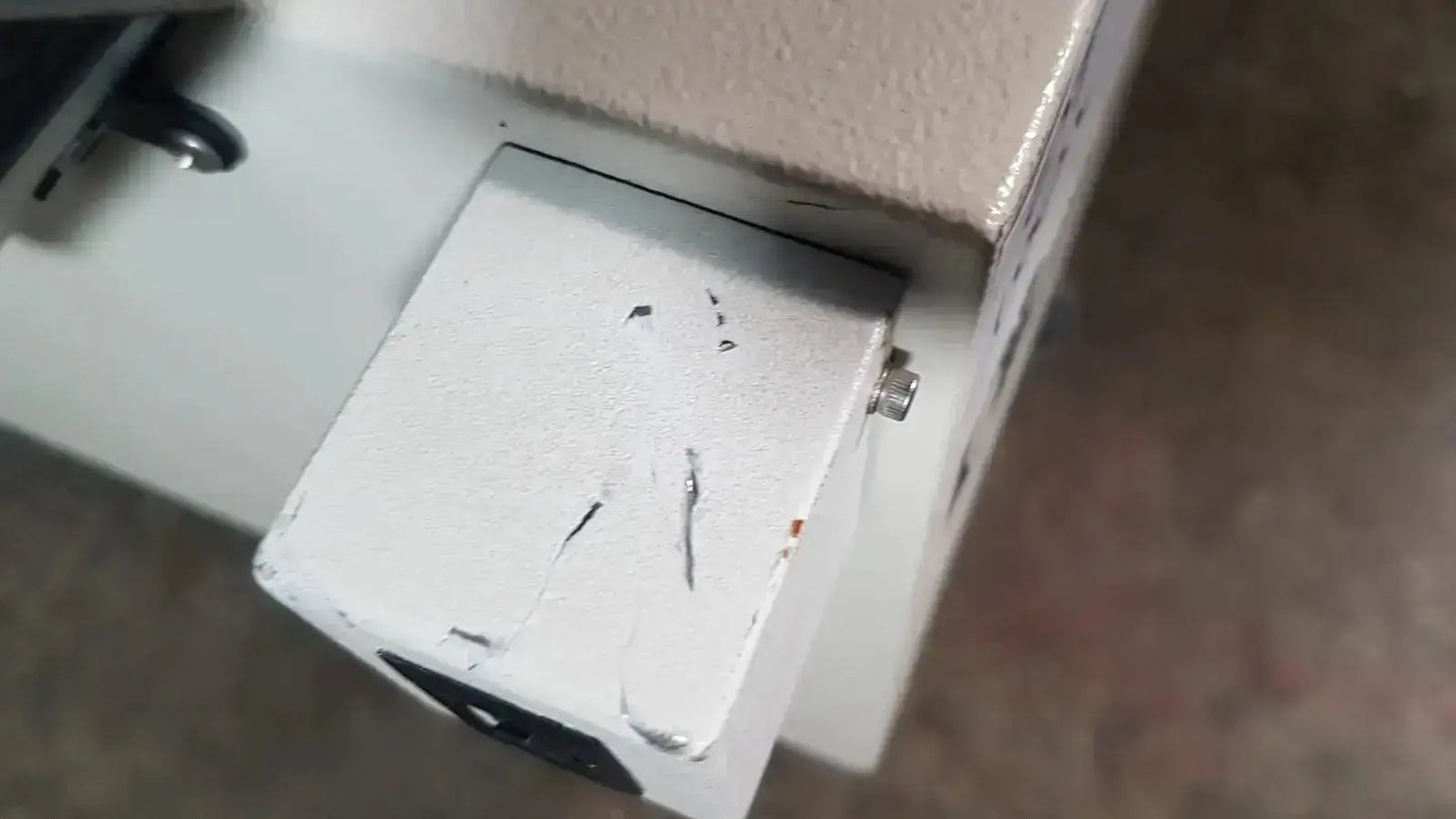 White slightly chipped rectangular box with metallic screw on side of excellent spex 6850 freezer mill for biomedical evaluation