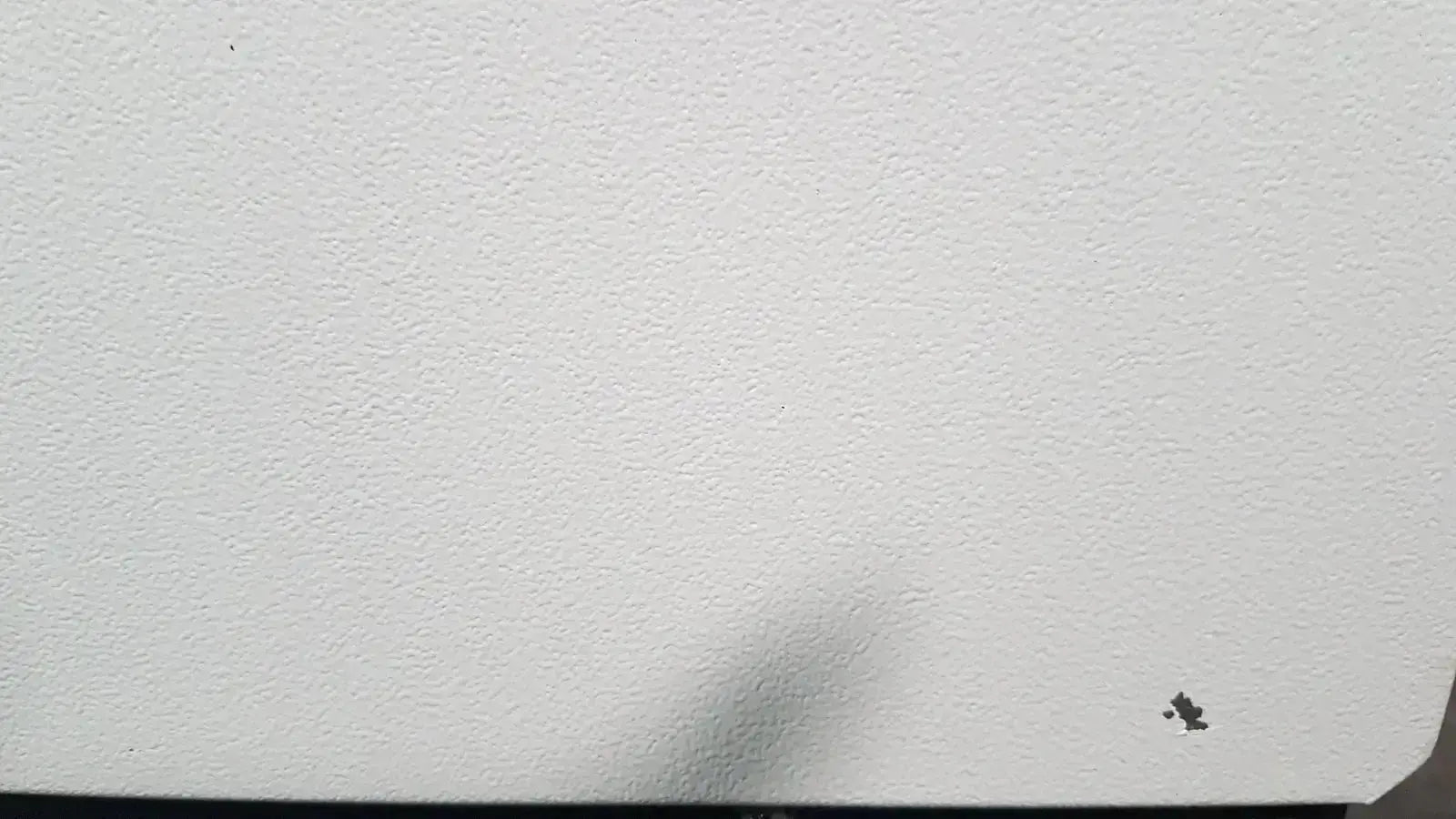 White textured wall surface detail of excellent spex 6850 freezer mill used for biomedical evaluation in hospital surplus