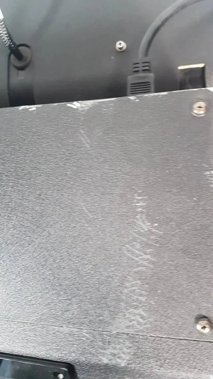 Gray textured metal panel with screws and minor scratches on the excellent spex 6850 freezer mill for biomedical evaluation
