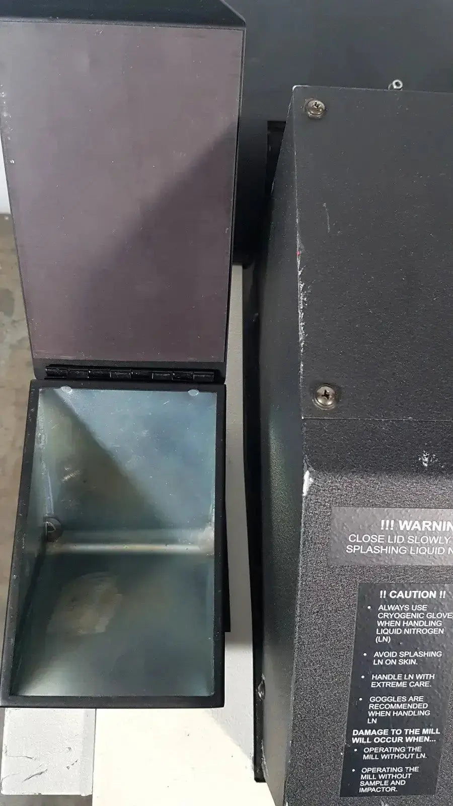 Black industrial-grade excellent spex 6850 freezer mill with hinged lid and warning labels for biomedical evaluation and hospital surplus