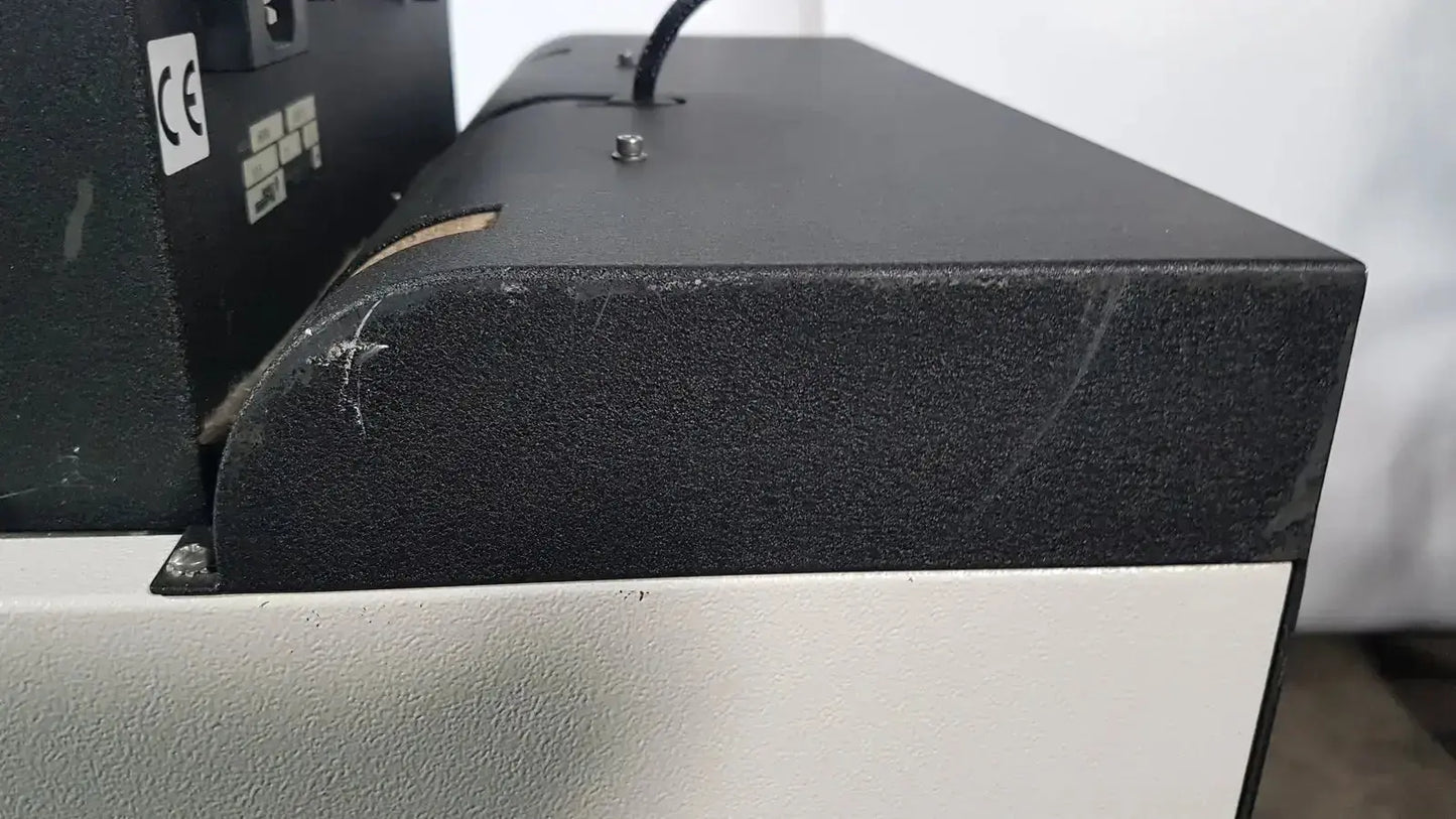 Black textured top panel with white lower section of the excellent spex 6850 freezer mill for biomedical evaluation and hospital surplus