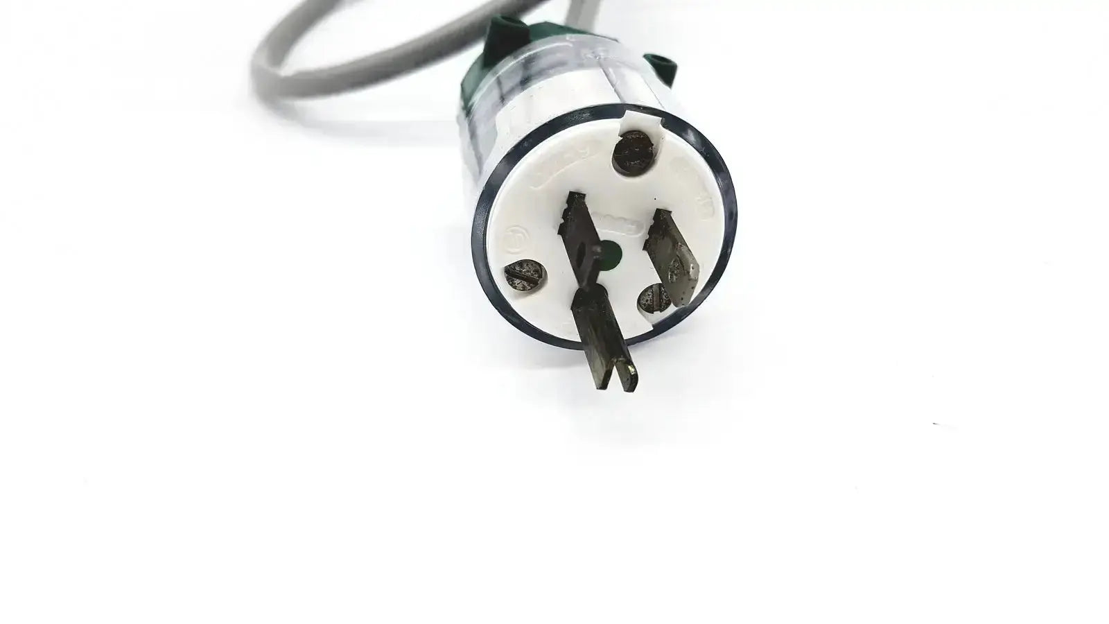 Black and white three-prong electrical plug on grey AC power cable exito exp-005 grey for reliable power connection