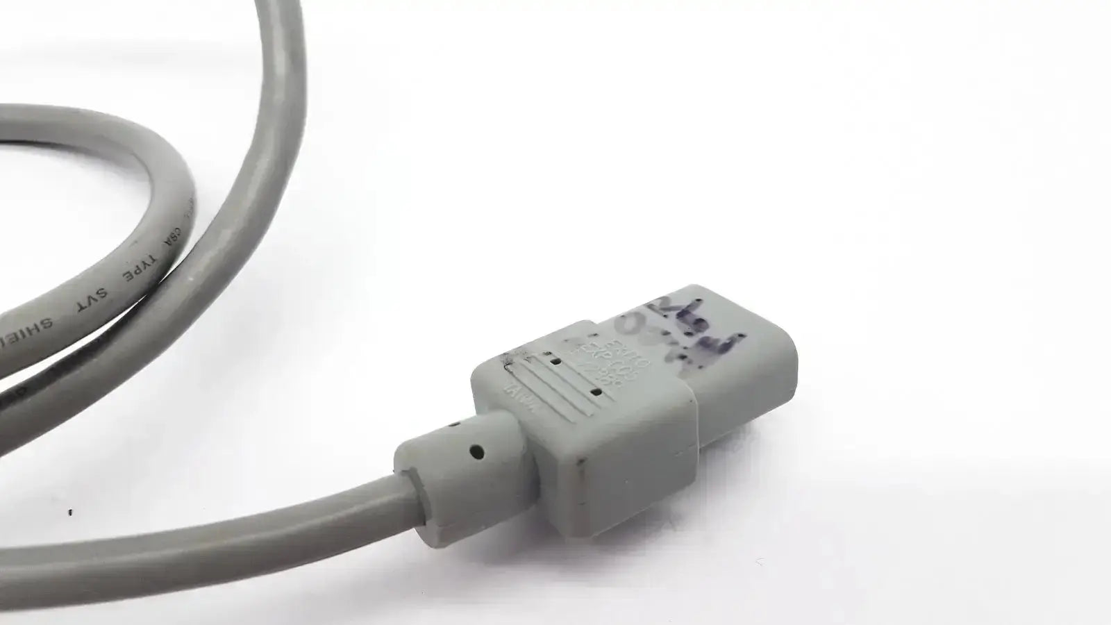 Exito exp-005 grey ac power cable with rectangular molded plastic plug and visible text markings on gray power cord