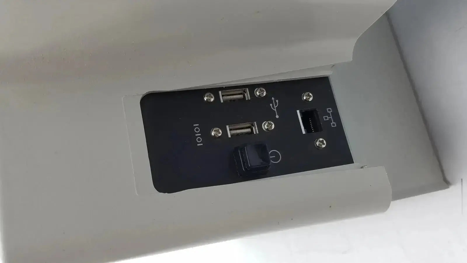 Back side of eyecon by gse mode 9400 hospital surplus pill counter with black usb and ethernet ports in gray housing