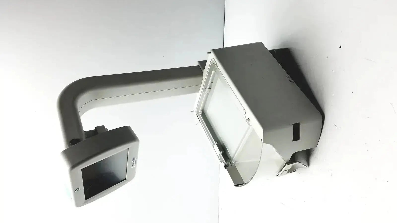 Gray industrial-style wall-mounted led light fixture with curved arm eyecon by gse mode 9400 hospital surplus pill counter use