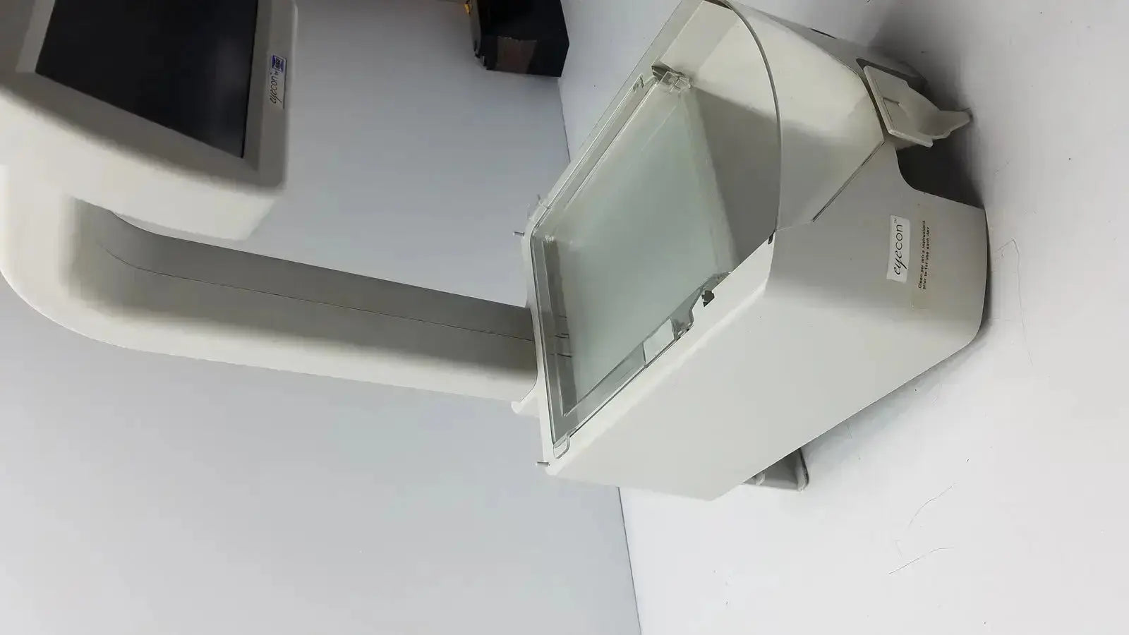 White plastic dental scanner with curved arm and transparent lid eyecon by gse mode 9400 for hospital surplus use
