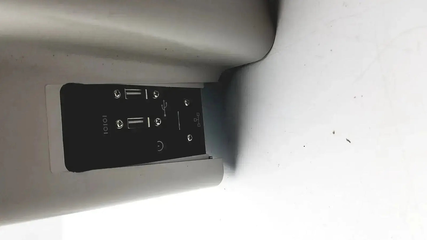Black rectangular usb charging hub with multiple ports mounted on silver eyecon by gse model 9400 used medical equipment for sale