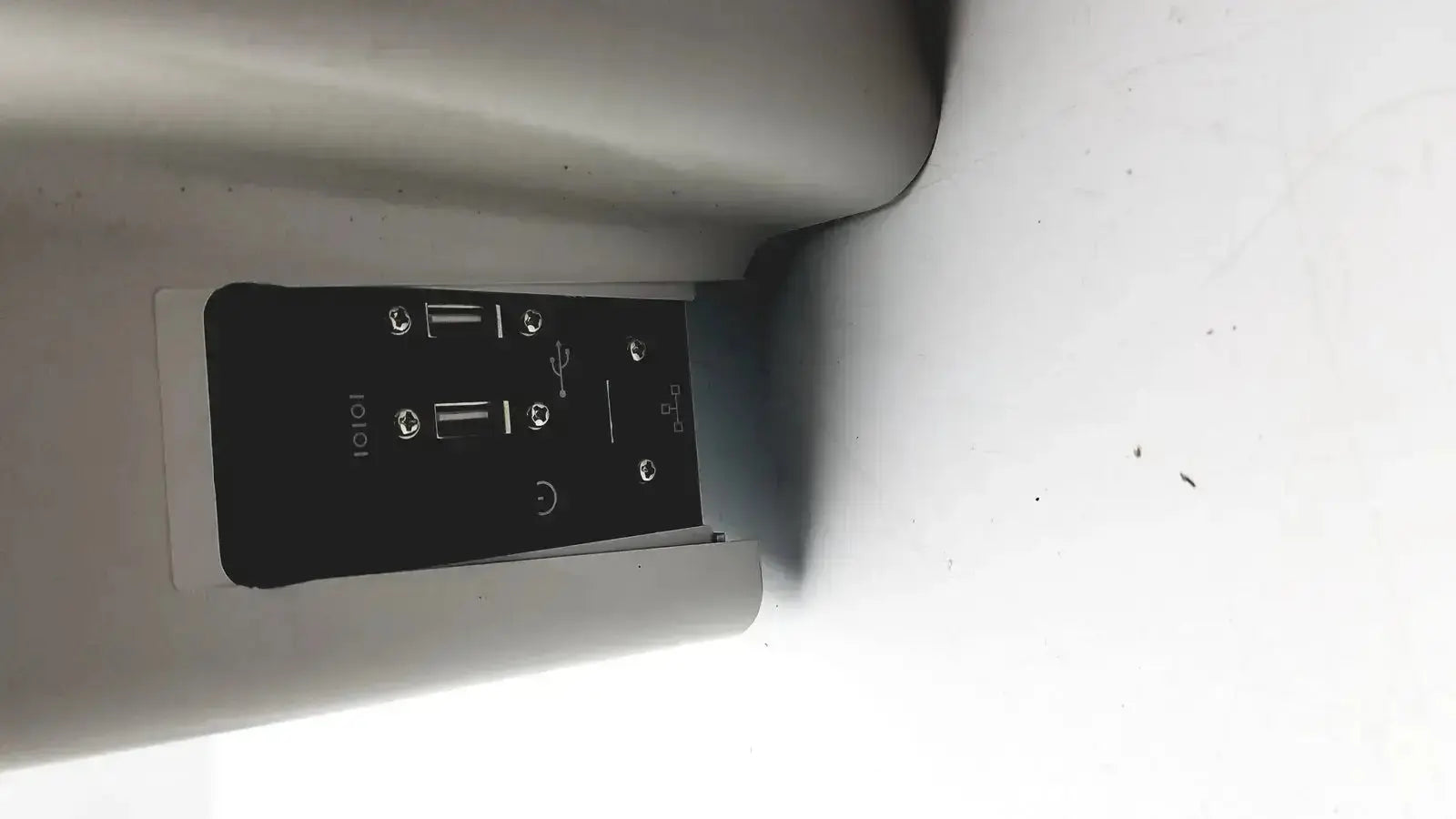 Black rectangular usb charging hub with multiple ports mounted on silver eyecon by gse model 9400 used medical equipment for sale
