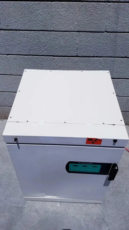 White industrial-grade fisher scientific co2 incubator cabinet with green digital control panel and black handle