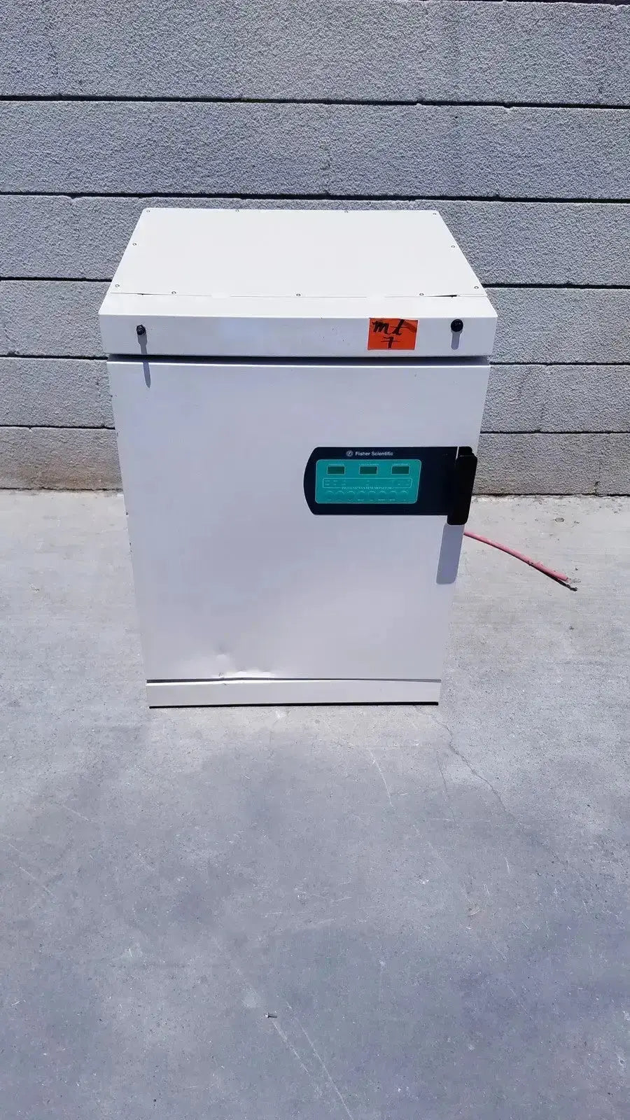 White rectangular Fisher Scientific CO2 incubator 116885H with black handle and teal control panel for lab use
