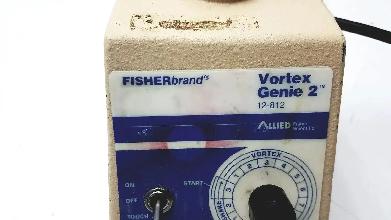 Fisher scientific vortex genie 2 vortexer with beige textured casing and blue rotary speed control panel mixer shaker