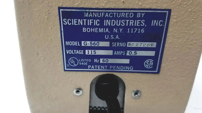 Beige industrial sewing machine with blue fisher scientific vortex label for vortex genie 2 mixer shaker use