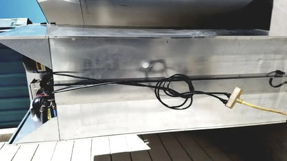 Stainless steel fisher scientific isotemp laboratory freezer refrigerator with black coiled hoses and yellow power cord