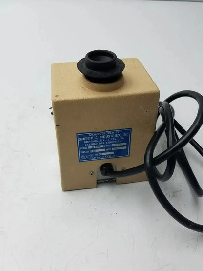 Beige scientific industries g-560 mixer shaker with black rubberized top and coiled power cord by fisher scientific