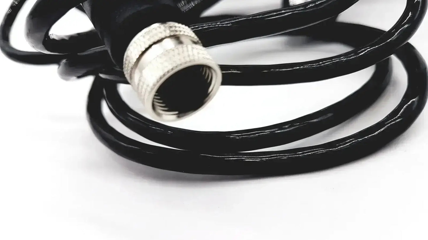 Black coiled cable with silver metallic connector compatible with med-mizer allcare beds for secure connection