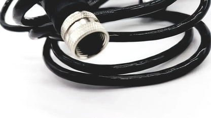 Black coiled cable with silver metallic connector compatible with med-mizer allcare beds for secure connection