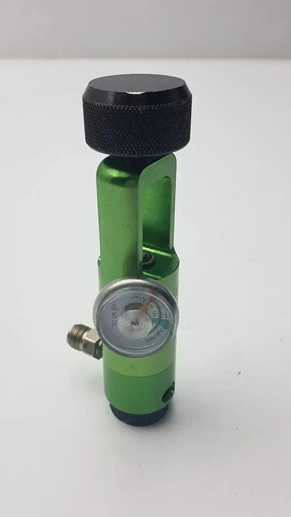 Green aluminum flotec mri compatible oxygen regulator with black knurled top and silver pressure gauge