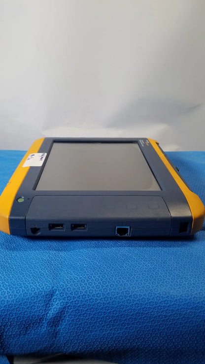 Yellow and gray fluke networks optiview xg network analysis tablet with rugged design and multiple side ports