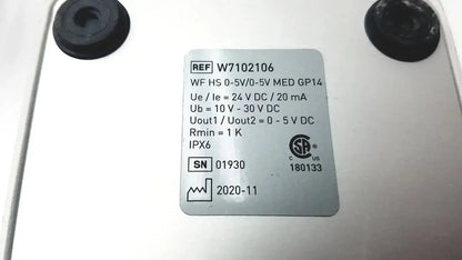 White rectangular label with black printed text and certification mark on the back of footswitch w7102106 with power cable used medical equipment for sale