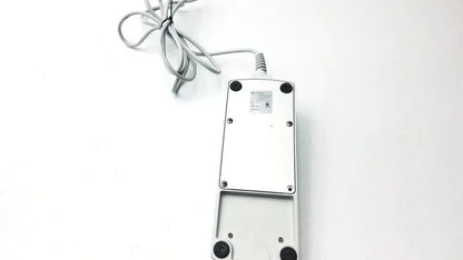 Footswitch w7102106 silver rectangular pedal with coiled power cable and black rubber feet used medical equipment for sale