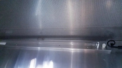 Silver perforated metal panel with reflective surface and circular holes on forma scientific biological safety cabinet