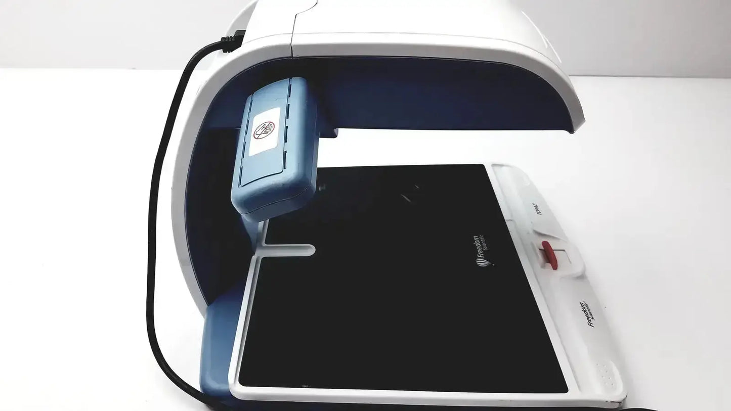 White and blue uv light curing lamp with sleek modern design from freedom scientific topaz xl hd regulatory model 10010