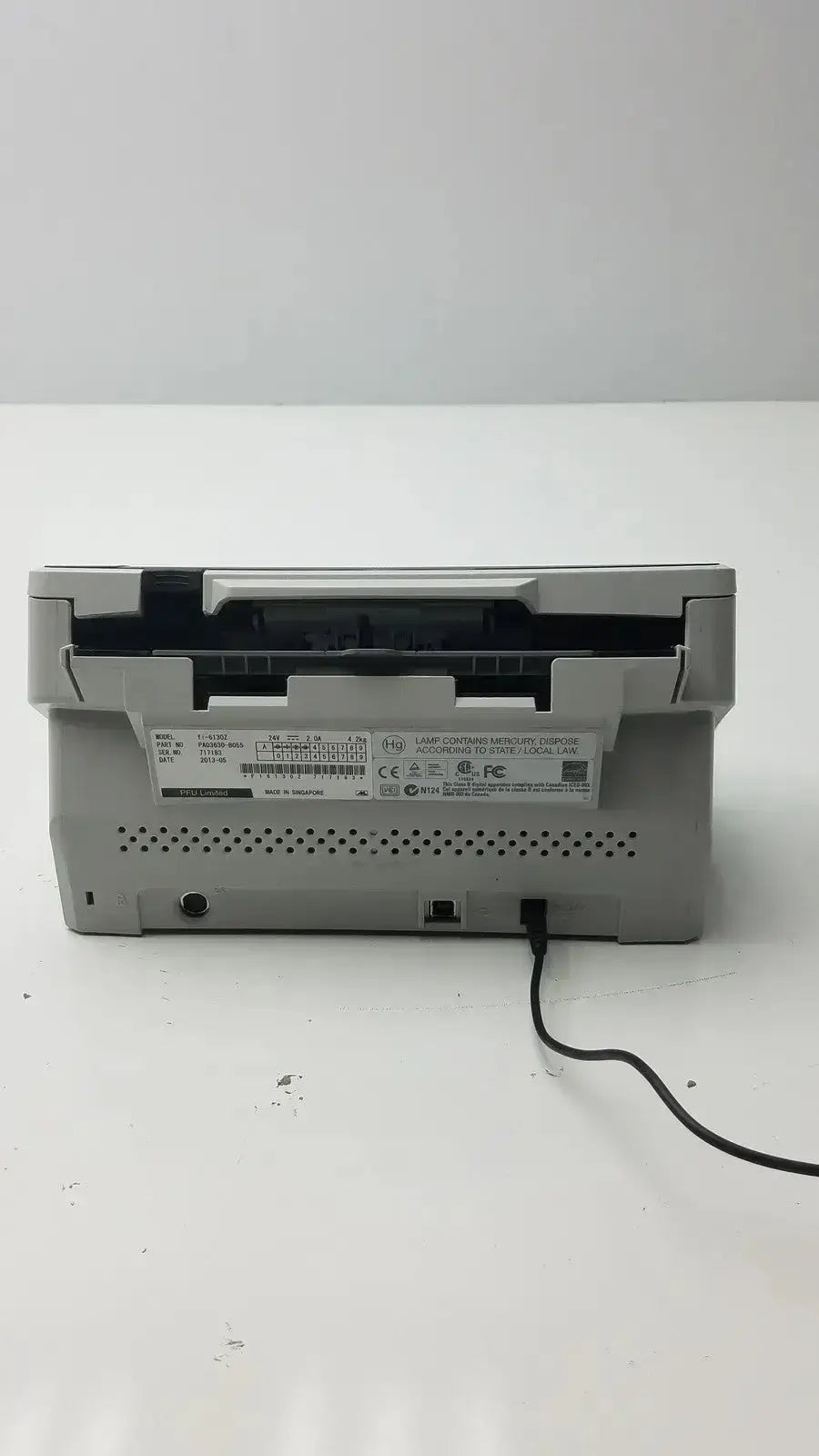 Gray plastic hp laserjet mfp 2545 printer rear view with black power cord illustrating fujitsu fi-6130z high-speed duplex use