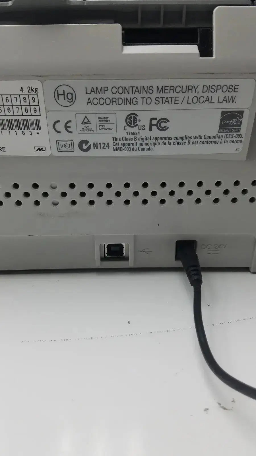 White plastic back panel of fujitsu fi-6130z high-speed duplex document scanner with usb port and regulatory labels