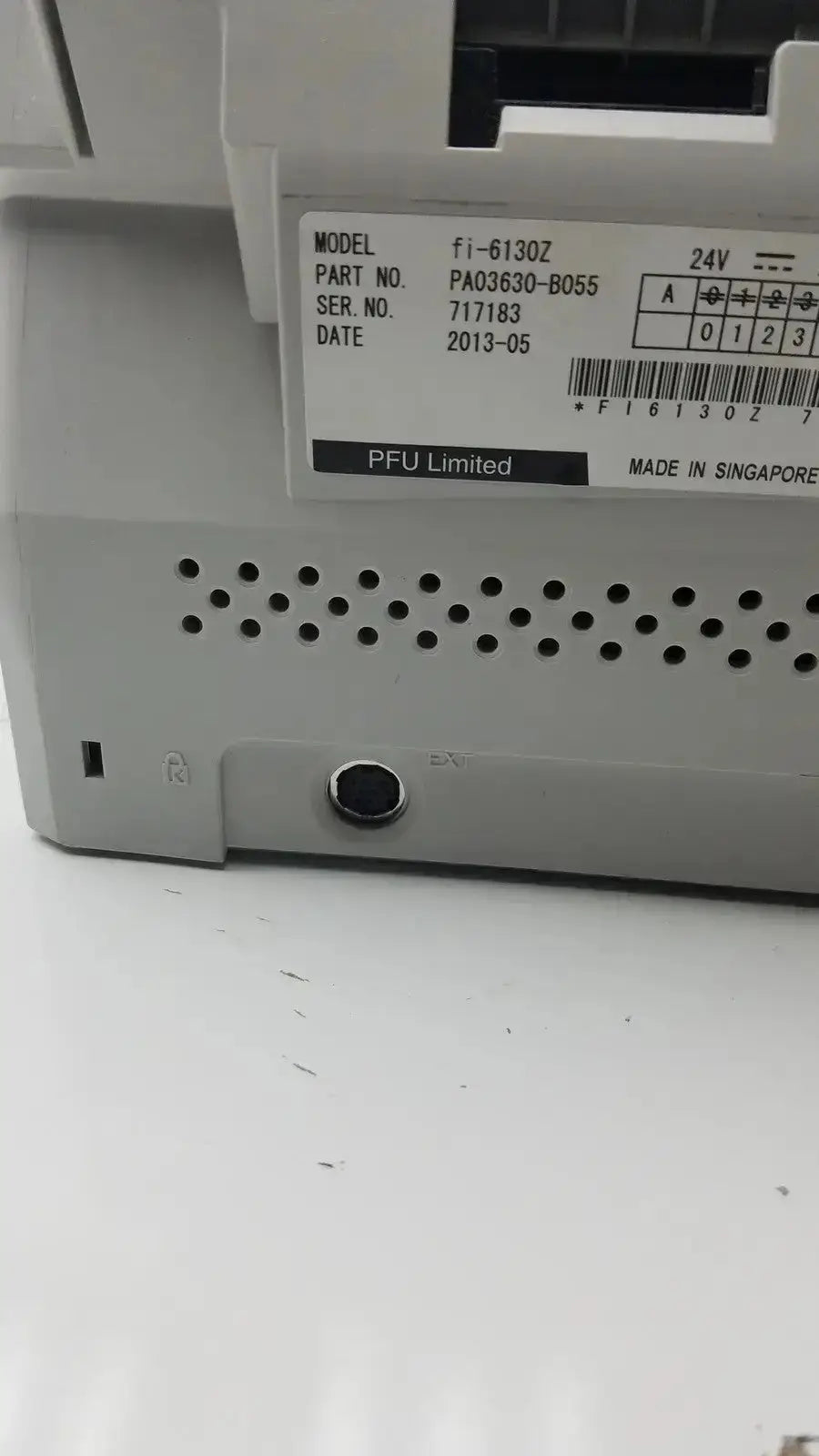 Gray plastic fujitsu fi-6130z high-speed duplex document scanner with model number fi-6130z and serial number 717183