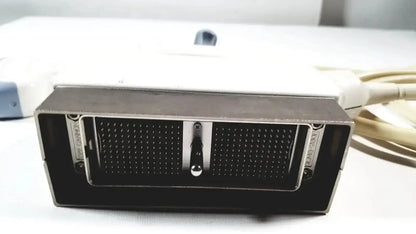 Black rectangular GE 4C convex array ultrasound transducer probe with metallic frame and dual perforated grilles