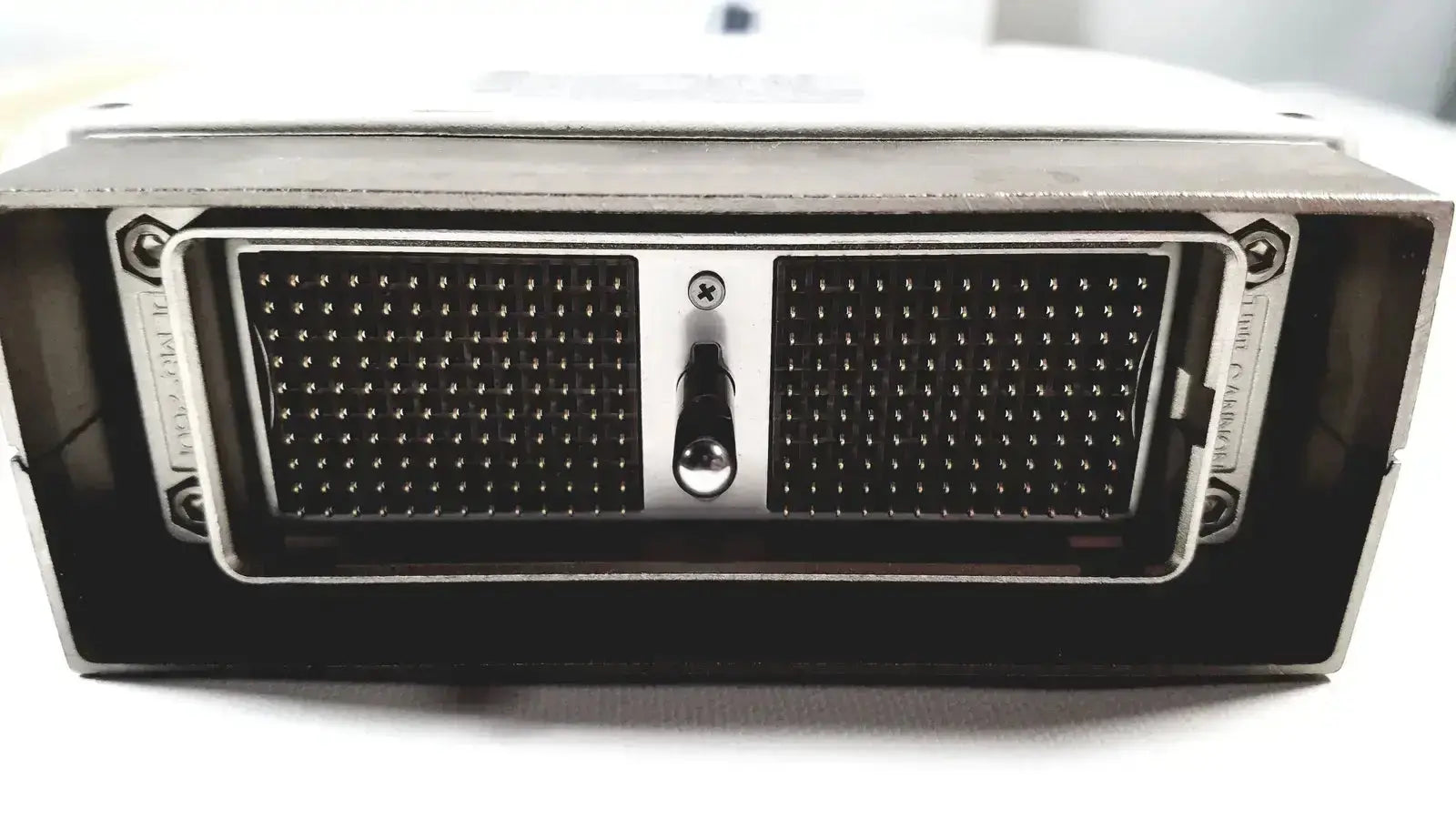Silver metal server rack back side with black perforated panels and screw for ge 4c convex array ultrasound probe