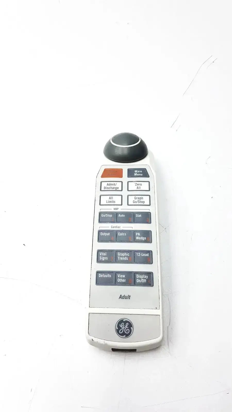 White ge adult solar 8000m 8000i remote control with black and orange buttons and circular knob at top