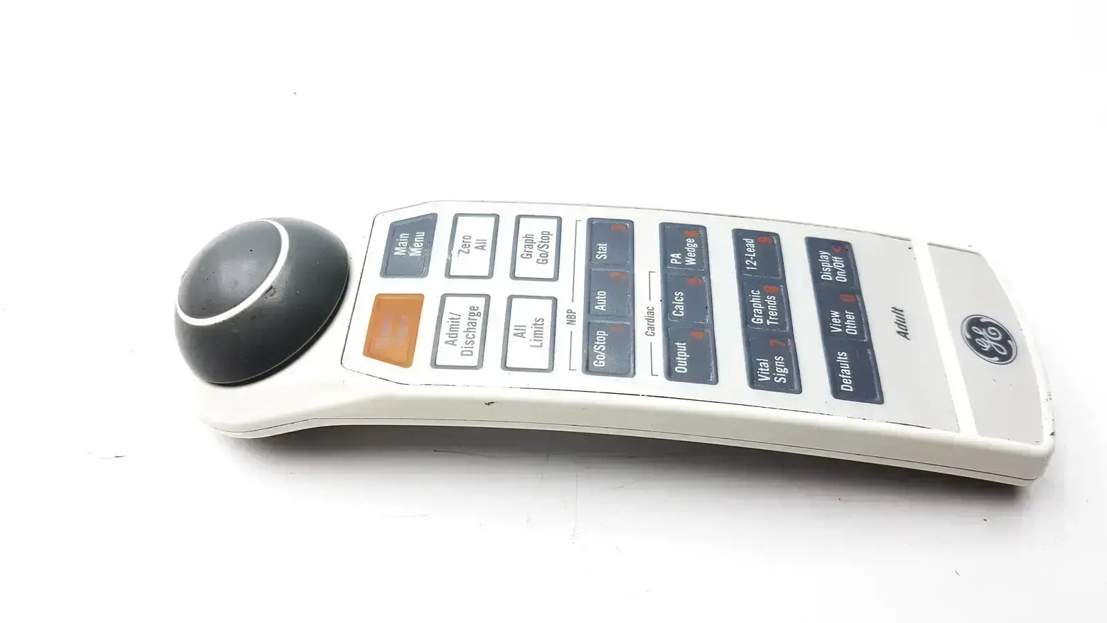 White GE adult solar 8000m 8000i remote control device with a black spherical trackball on the left side