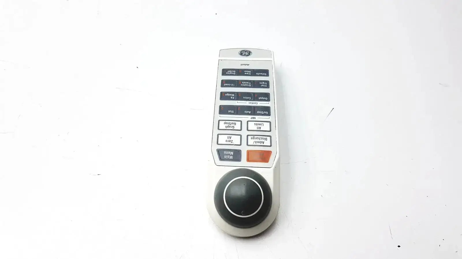 White GE adult solar 8000m 8000i remote control with black buttons and a circular directional pad for easy navigation