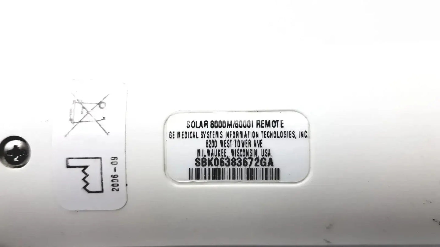 White plastic label on the back of a ge adult solar 8000m 8000i remote control showing model details