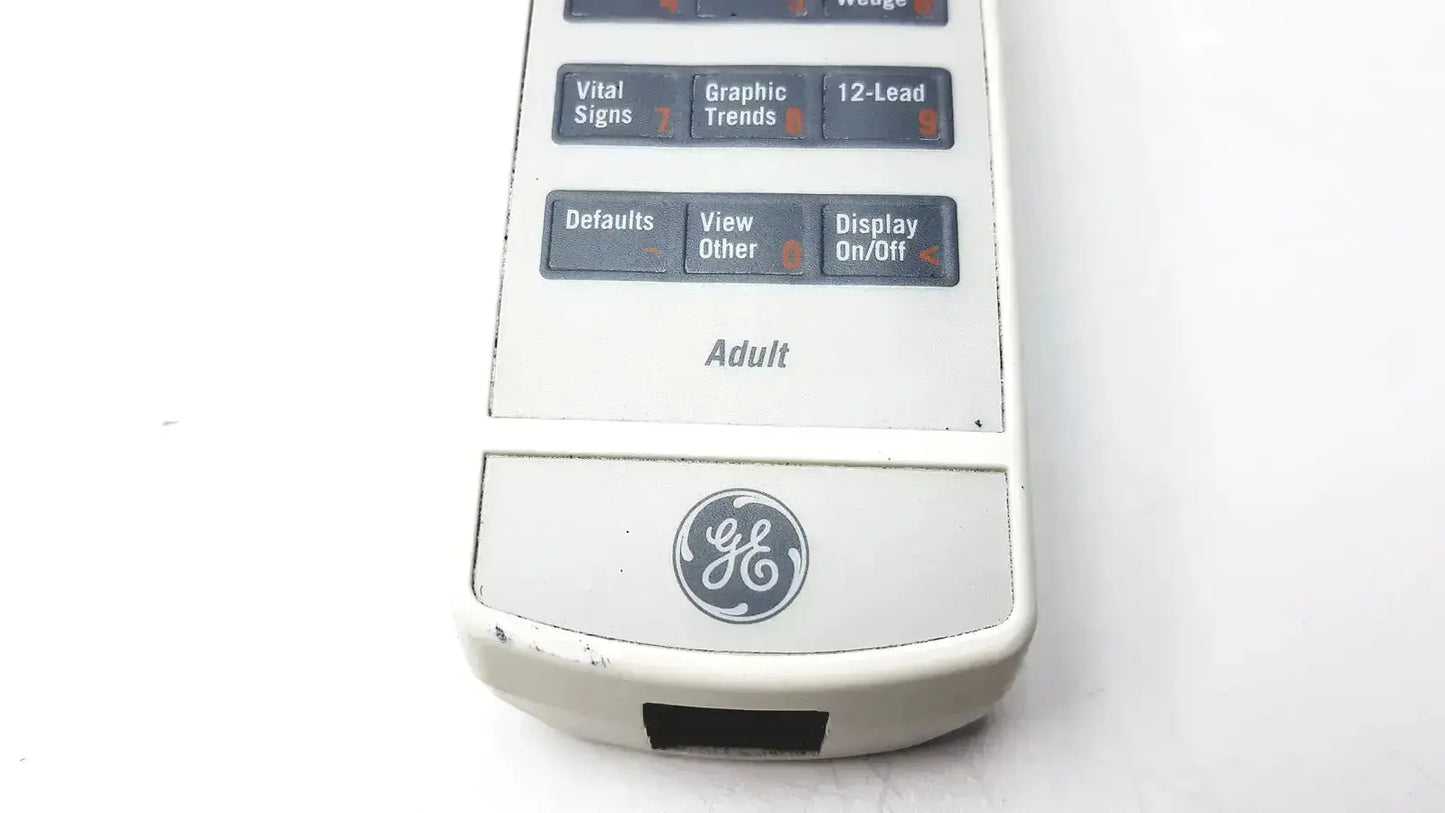 White plastic ge adult solar 8000m 8000i medical monitor remote control with gray labeled function buttons for vital signs and trends