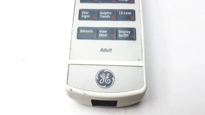 White plastic ge adult solar 8000m 8000i medical monitor remote control with gray labeled function buttons for vital signs and trends
