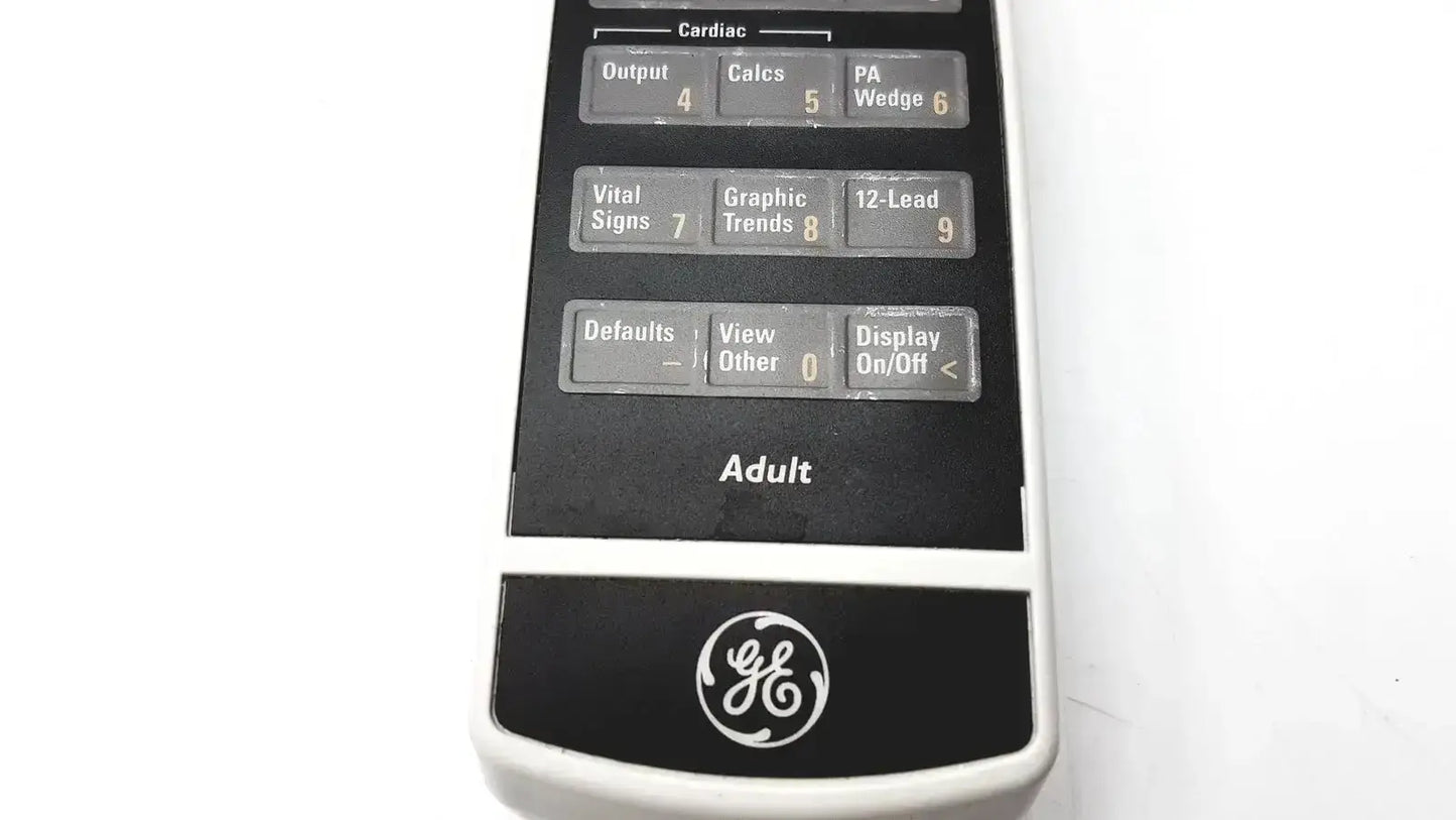 Black and white GE Adult Solar 8000M remote control with labeled buttons for cardiac functions medical device use