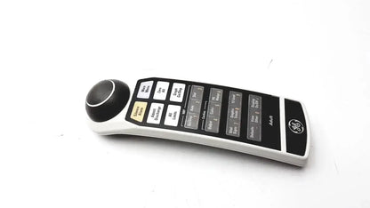 White and black GE Adult Solar 8000M remote control with circular dial on left side for solar 8000M remote operation