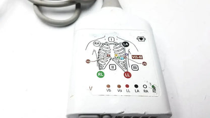 White plastic GE CARESCAPE ECG parameter cable adapter with printed micro module chest electrode placement diagram