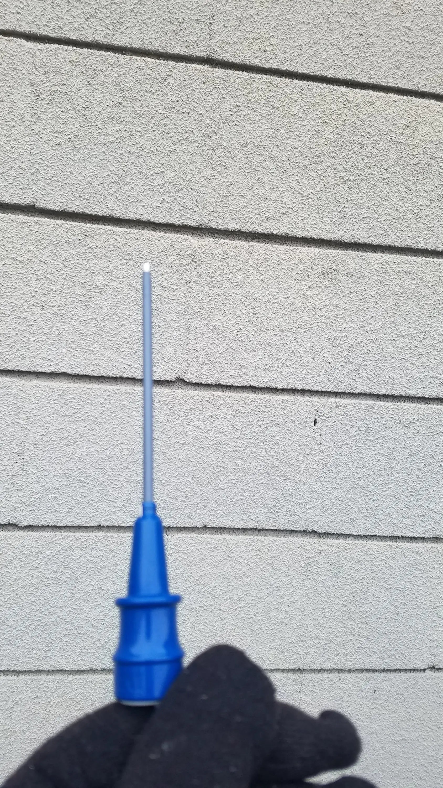 Blue plastic syringe needle with translucent barrel and metallic tip for reuse medical equipment in dinamap procare dpc monitor