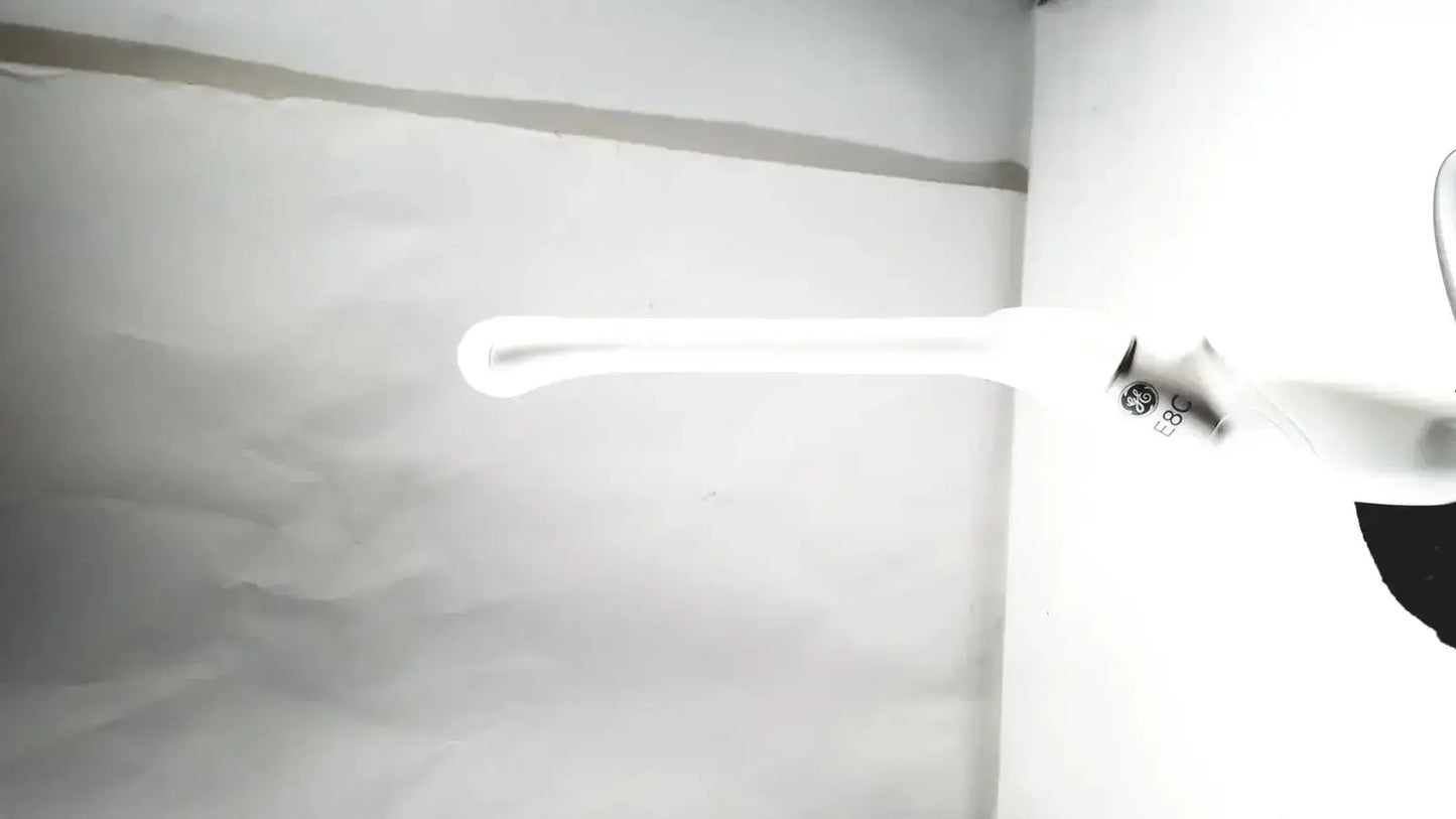 White ge brand led light fixture with sleek elongated design and smooth surface finish for ultrasound probe transducer endo use
