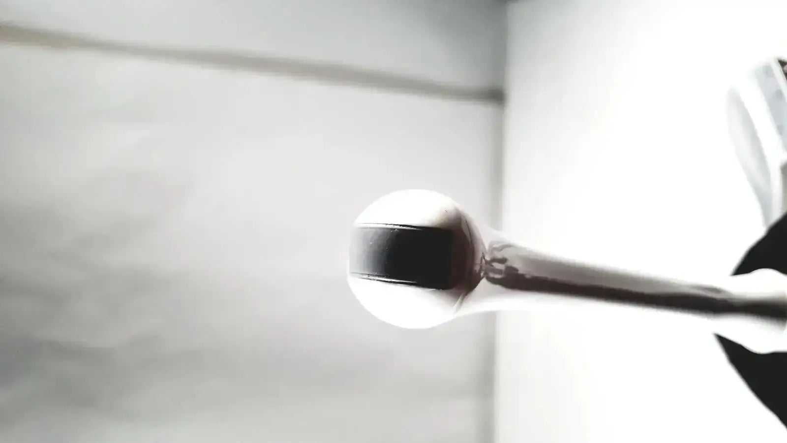 Shiny chrome gear shift knob with black stripe featured on the ge e8c-rs ultrasound probe transducer endo vaginal
